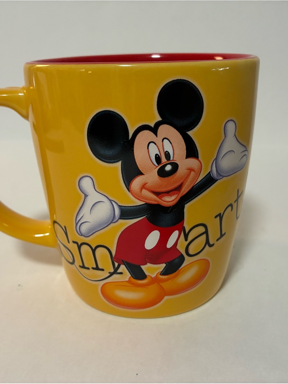 Disney Yellow Mug with Red Interior and Mickey Mouse Graphic